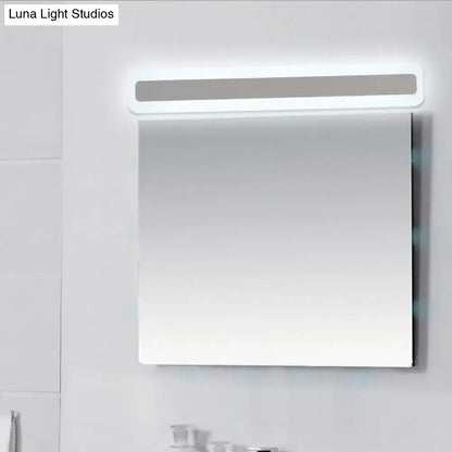 White Bar LED Wall Sconce by Decorbites with a rounded frame and soft glow above a mirror on Tampa Home & Garden Store