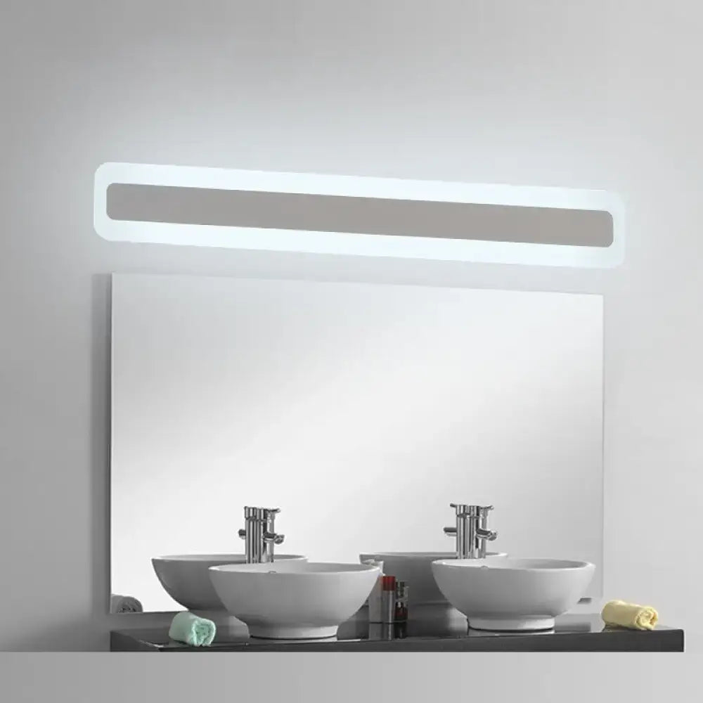 White Bar LED Wall Sconce over bathroom mirror; backlit fixture with two vessel sinks on Tampa Home & Garden Store