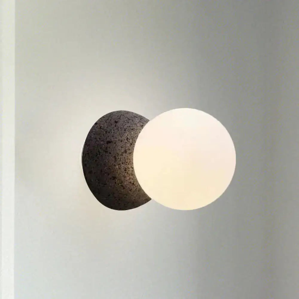 Stone Glass Wall Lamp by Decorbites with dark stone disk and white frosted glass globe on Tampa Home & Garden Store