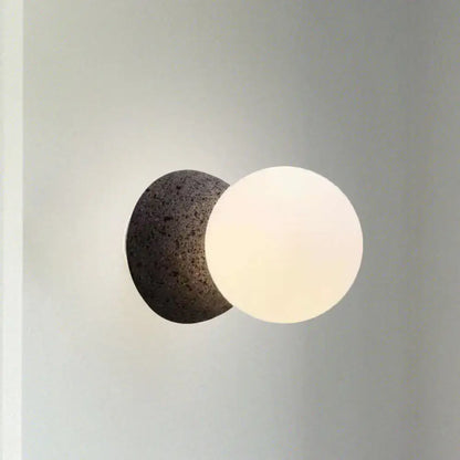 Stone Glass Wall Lamp by Decorbites with dark stone disk and white frosted glass globe on Tampa Home & Garden Store