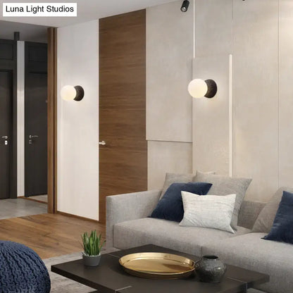 Stone Glass Wall Lamp pair by Decorbites on a white panel wall in a modern living room on Tampa Home & Garden Store