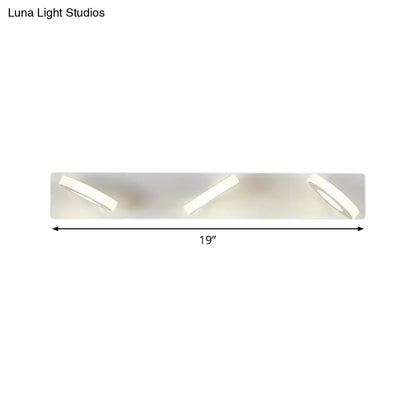 Decorbites white adjustable wall light with three angled spotlights on backplate on Tampa Home & Garden Store