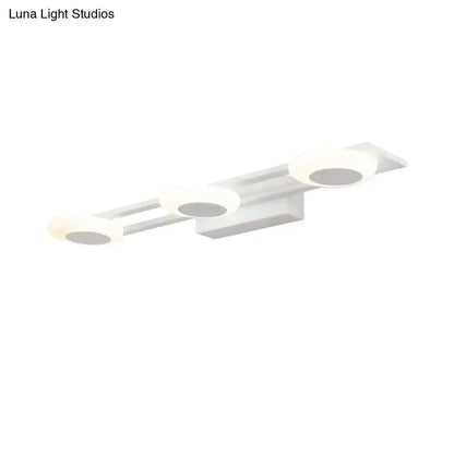 Modern white 3-light LED wall-mounted vanity sconce with circular heads on a horizontal bar on Tampa Home & Garden Store
