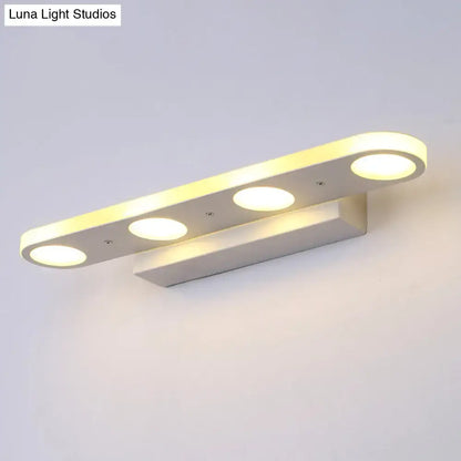White LED Vanity Wall Light by Decorbites with three circular LED heads on a curved white bar and wall mount on Tampa Home & Garden Store