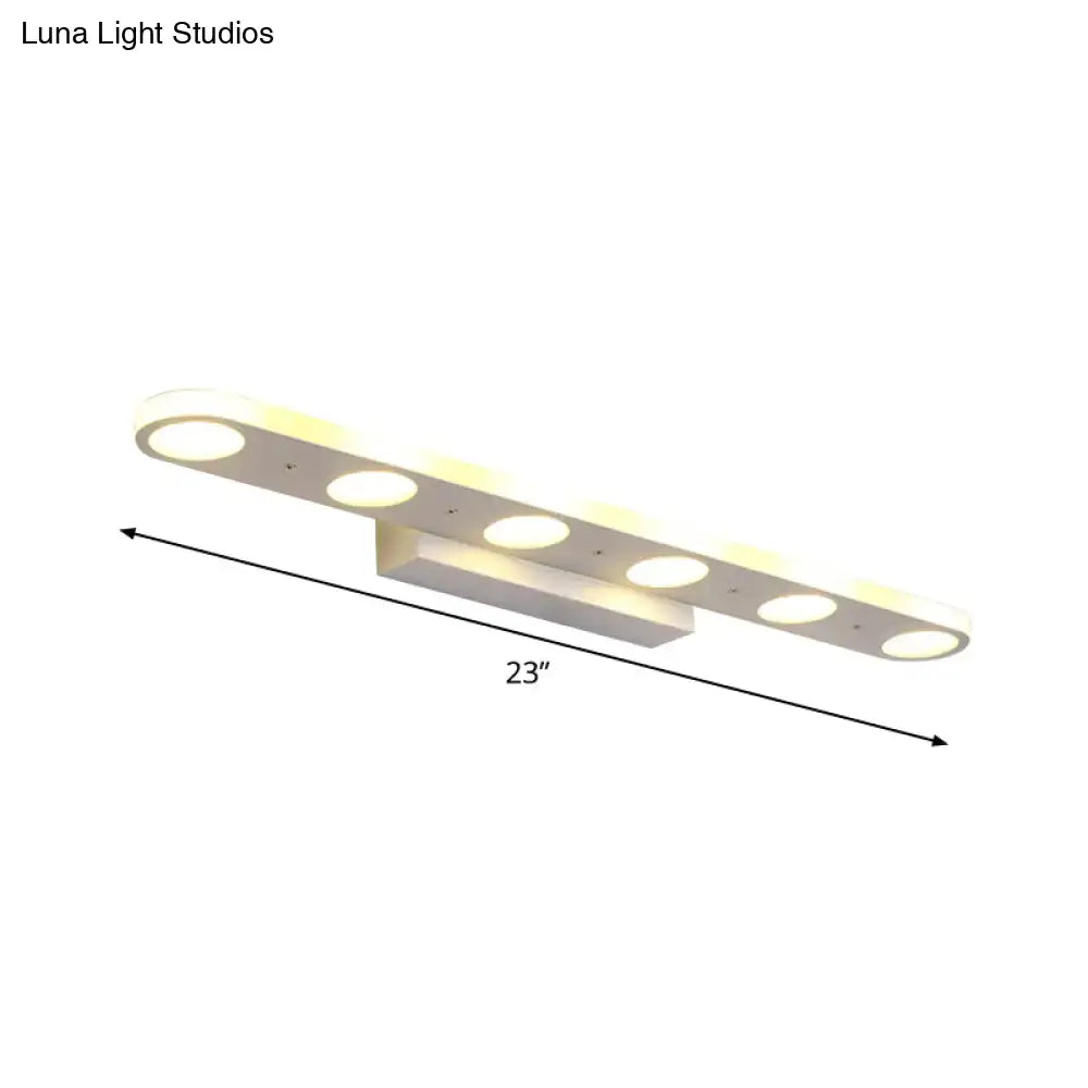 Decorbites white LED vanity wall light with multiple circular LEDs on a 23-inch bar on Tampa Home & Garden Store