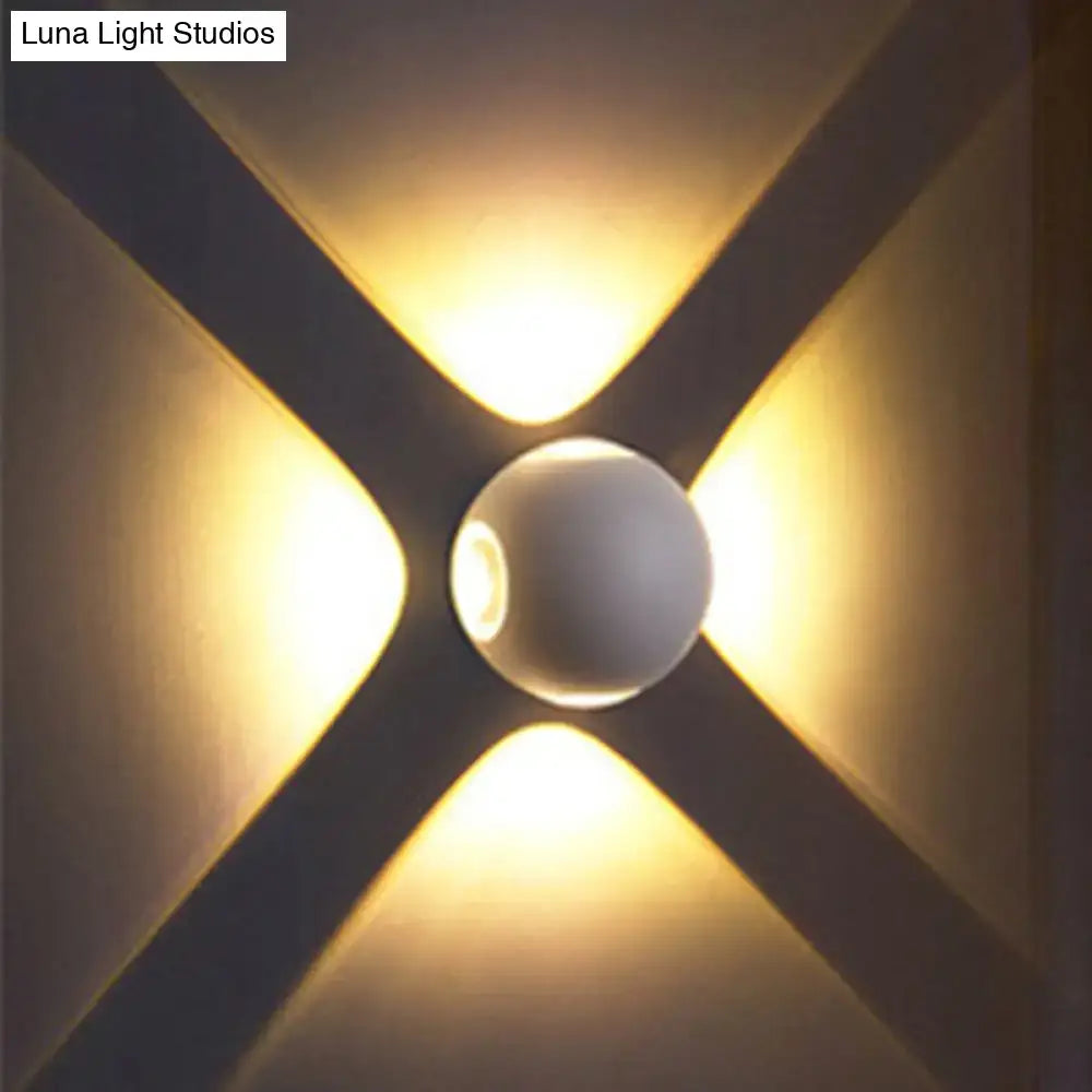White Dome Wall Sconce by Decorbites with round glass shade on X-backplate, warm glow on Tampa Home & Garden Store