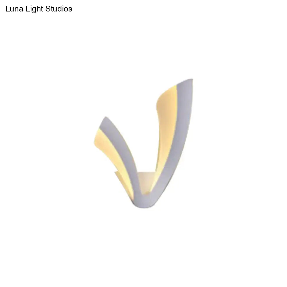 White acrylic LED table lamp by Decorbites with curved wing design and warm glow on Tampa Home & Garden Store