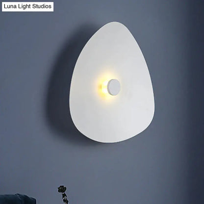 White flaky acrylic teardrop wall sconce with glossy finish and warm LED glow Decorbites on Tampa Home & Garden Store