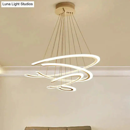 Modern white acrylic LED ring dining room chandelier pendant light with spiraling loops on Tampa Home & Garden Store