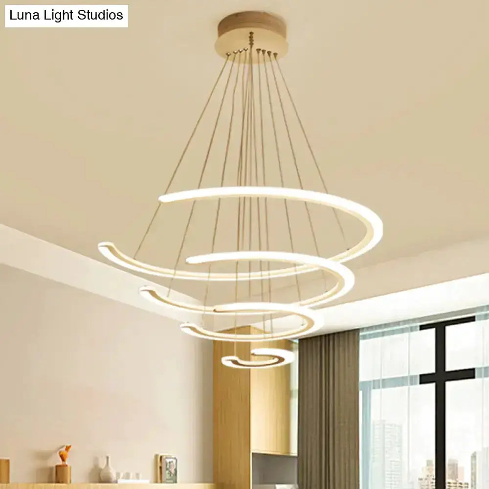 Modern white acrylic LED ring dining chandelier with spiraling rings by Decorbites on Tampa Home & Garden Store