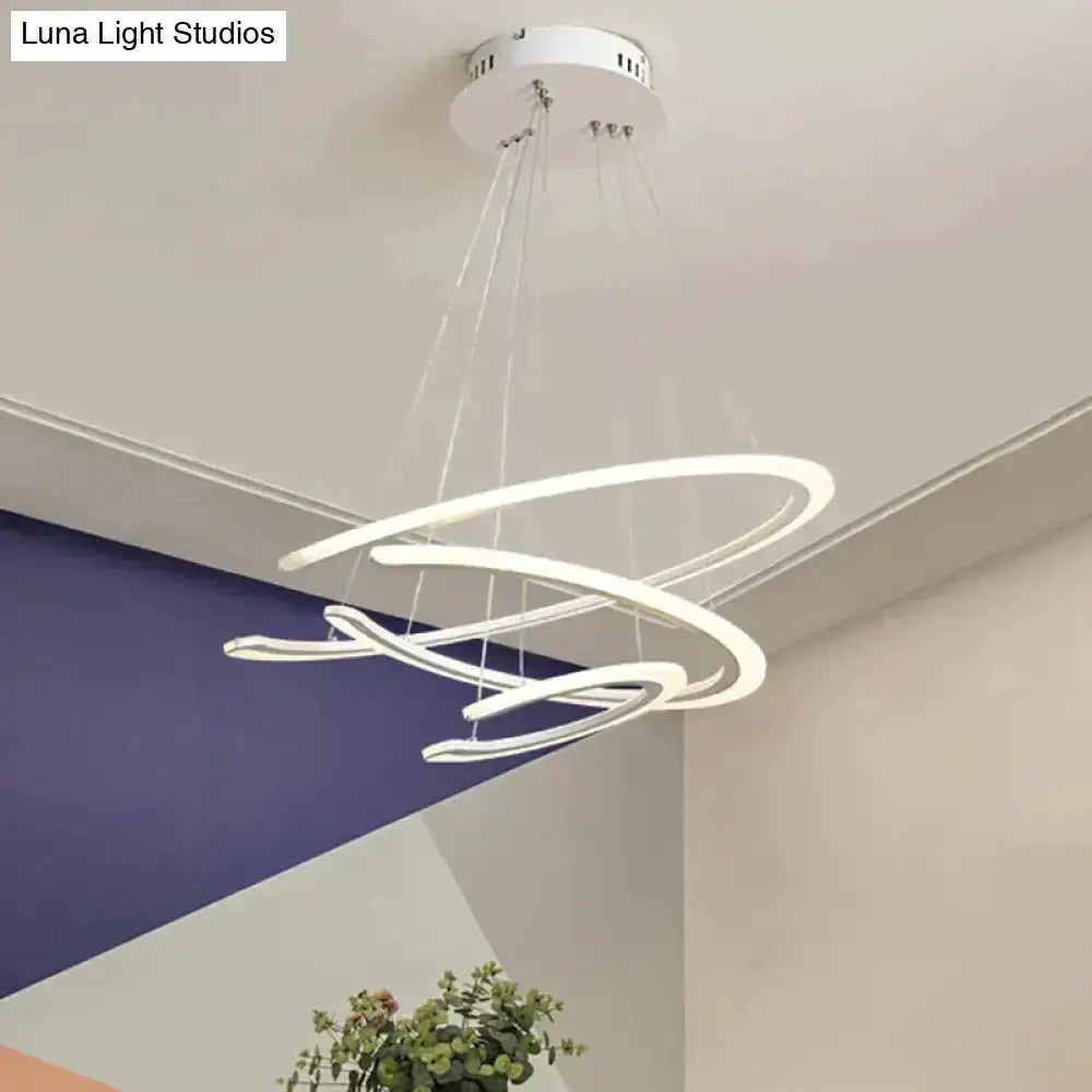 Modern white acrylic LED ring chandelier pendant light with looping rings, suspended by cables Decorbites on Tampa Home & Garden Store