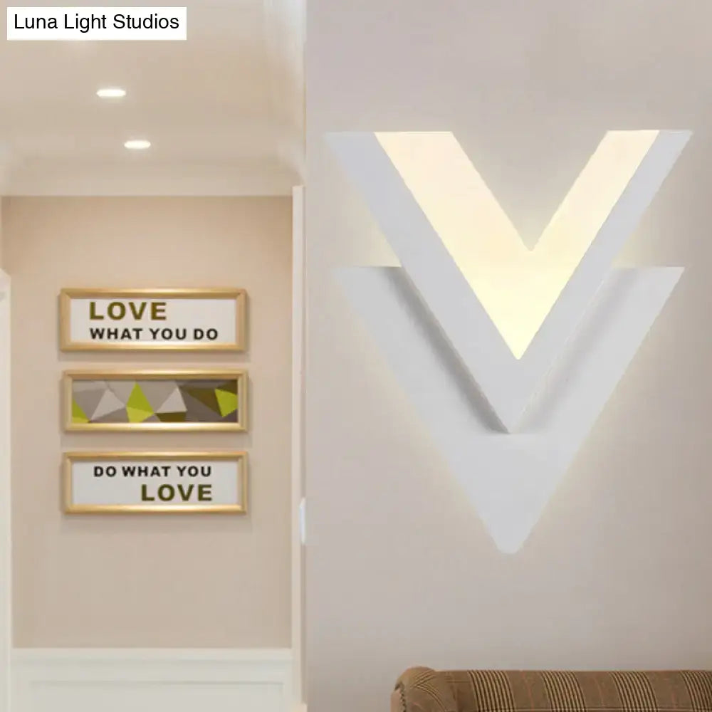 White Acrylic LED Sconce by Decorbites, V-shaped wall light with soft glow on Tampa Home & Garden Store