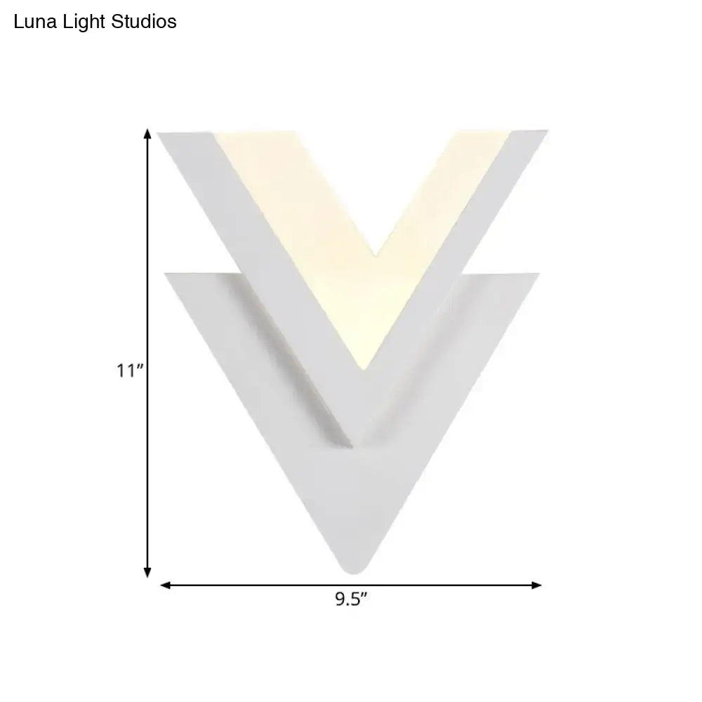 White acrylic LED sconce in a layered chevron V shape with warm glow by Decorbites on Tampa Home & Garden Store