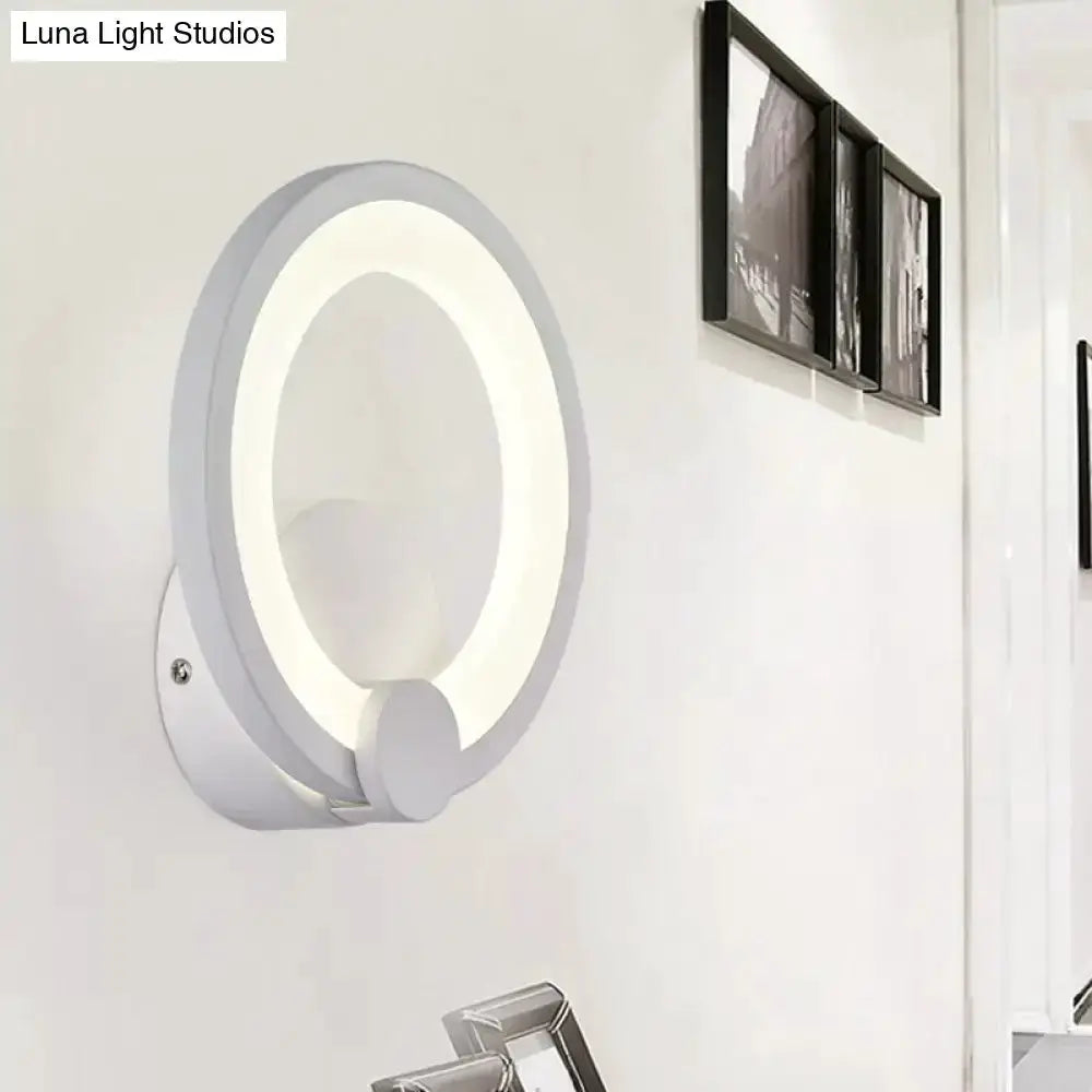 Modern white acrylic circular LED sconce light for bedroom wall on Tampa Home & Garden Store