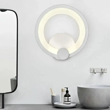 Modern white acrylic circular wall sconce light with LED ring by Decorbites on Tampa Home & Garden Store