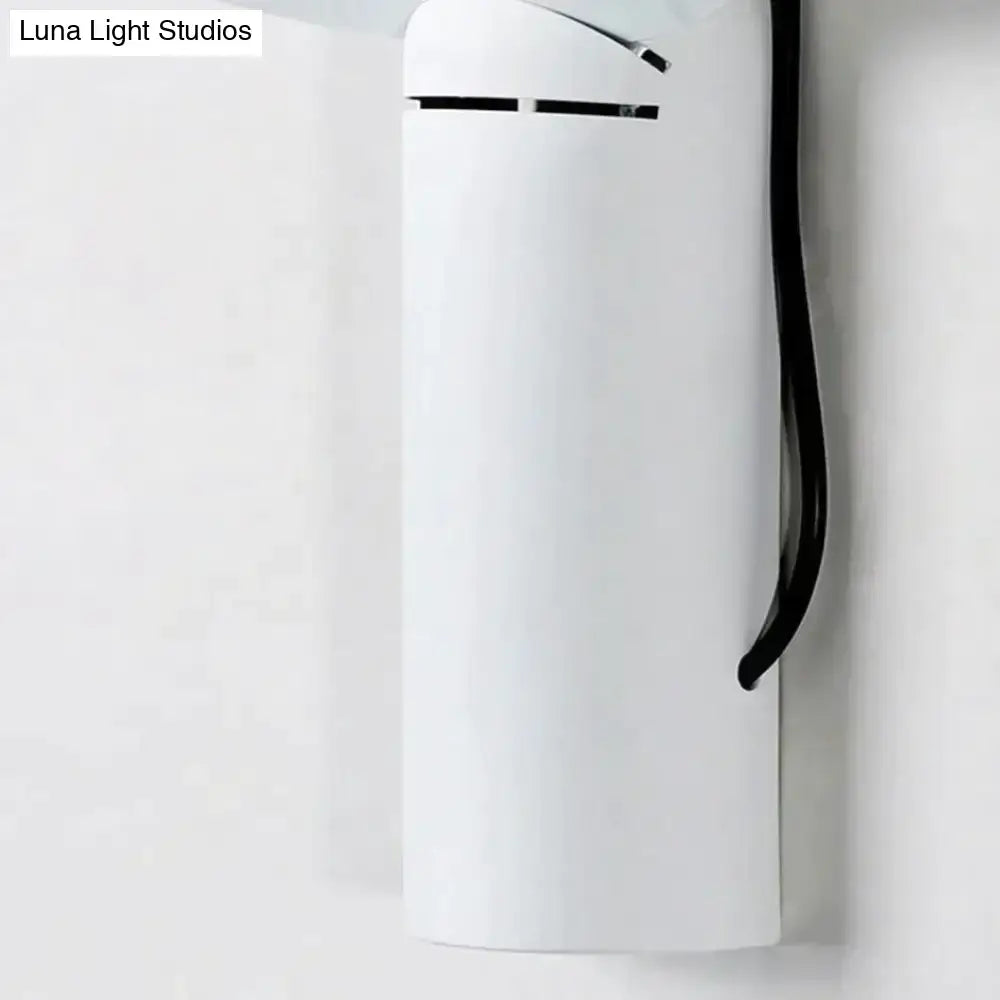White modern wall sconce with black cord Decorbites on Tampa Home & Garden Store