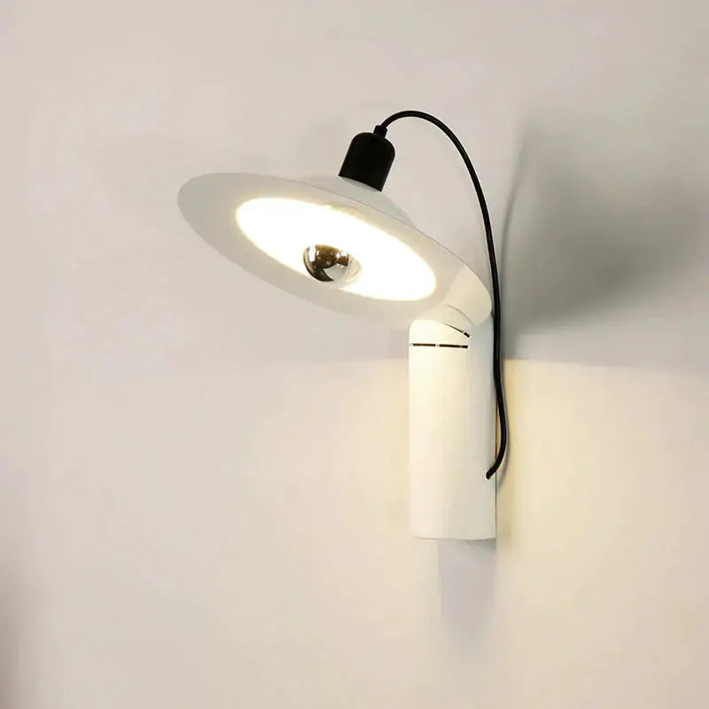 White modern wall sconce by Decorbites with white shade, black neck cord and wall mount on Tampa Home & Garden Store