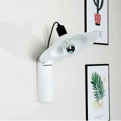 White modern wall sconce by Decorbites with oval shade and black accent on Tampa Home & Garden Store