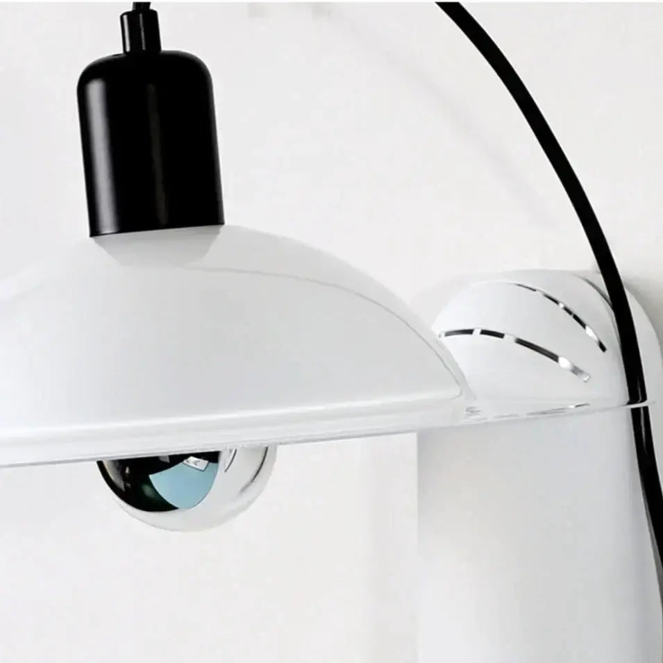 White modern wall sconce with black top cap and curved arm by Decorbites on Tampa Home & Garden Store