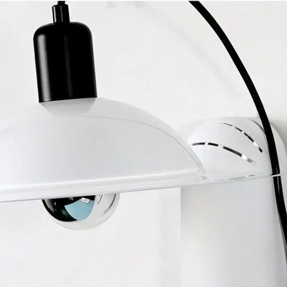White modern wall sconce with black top cap and curved arm by Decorbites on Tampa Home & Garden Store