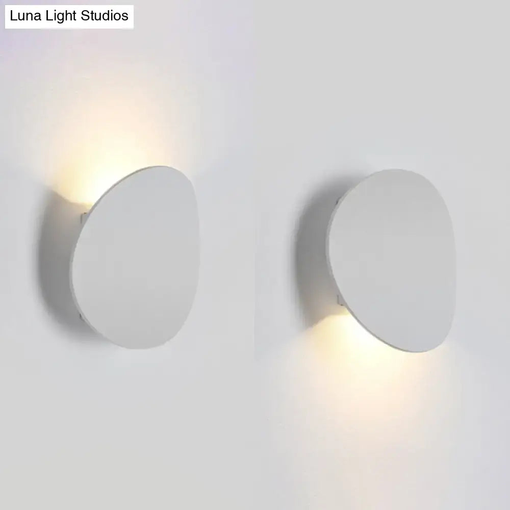LED wall sconce by Decorbites, pair of white circular wall lights with upward and downward glow on Tampa Home & Garden Store