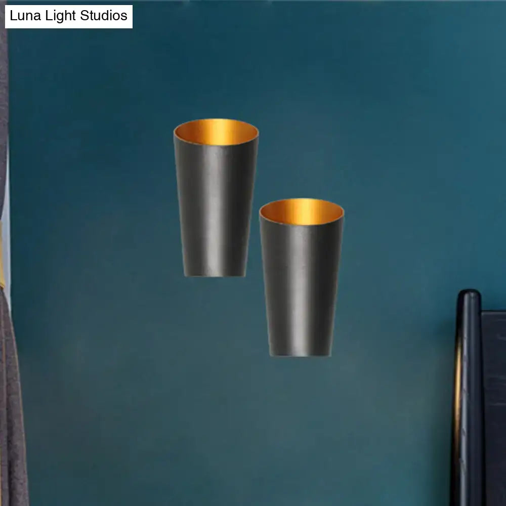 Decorbites White Gold LED Sconce pair, black exterior with gold interior, wall-mounted on Tampa Home & Garden Store