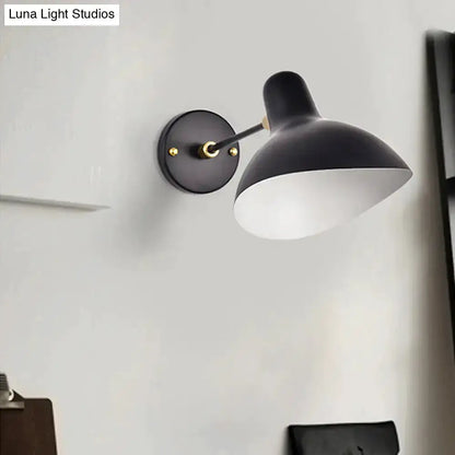 Wall-mounted lamp with adjustable arm, black shade, white interior, gold accents Decorbites on Tampa Home & Garden Store