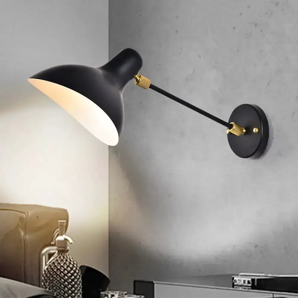Modern black wall-mounted lamp with adjustable arm and gold fittings, white interior shade on Tampa Home & Garden Store