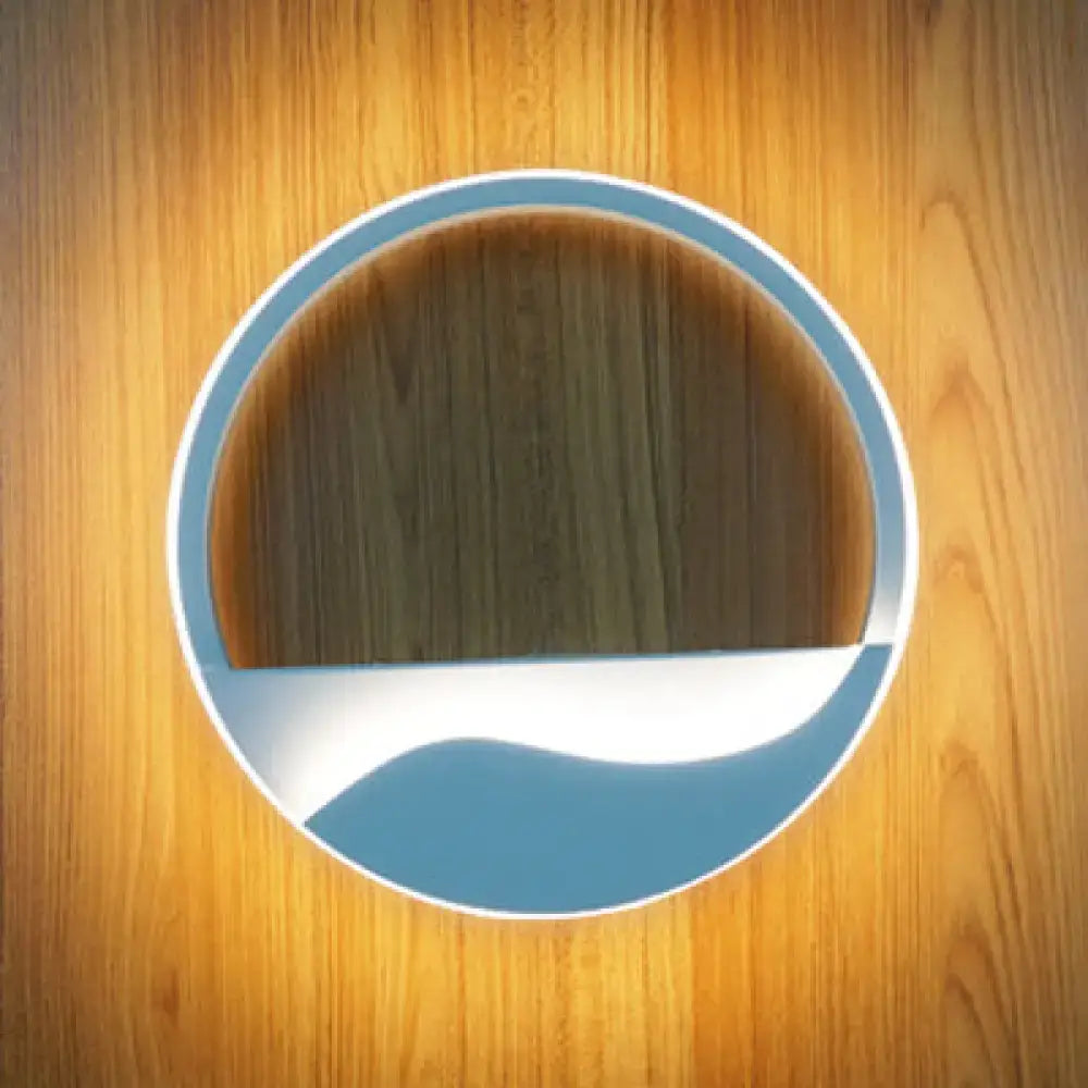 Acrylic wall sconce light with circular frame and blue-white wave motif Decorbites on Tampa Home & Garden Store