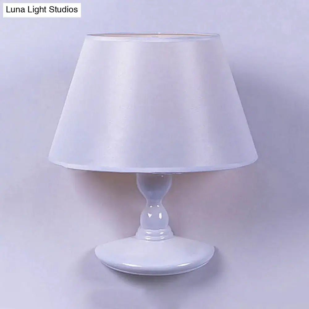 White cone lampshade table lamp with glossy white ceramic base on Tampa Home & Garden Store