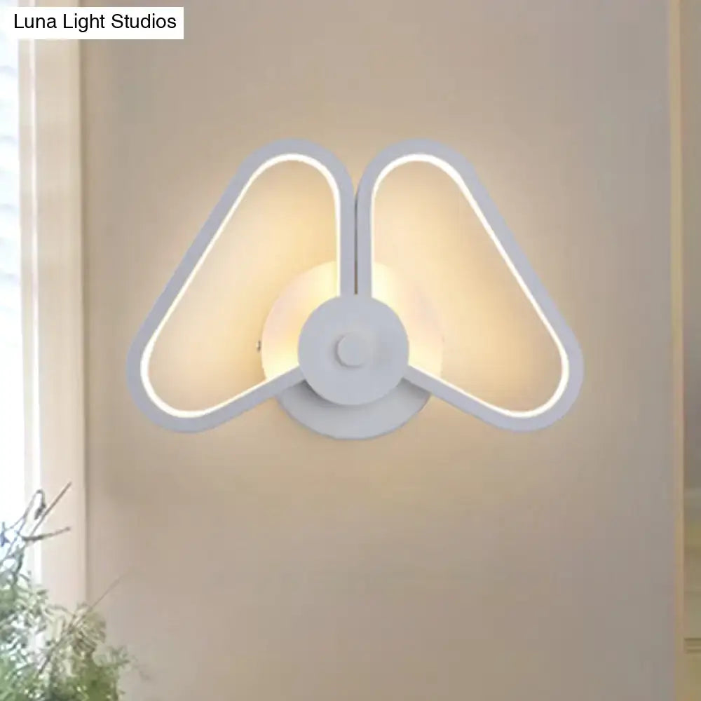 Black Triangle Wall Sconce with soft ambient LED glow on Tampa Home & Garden Store