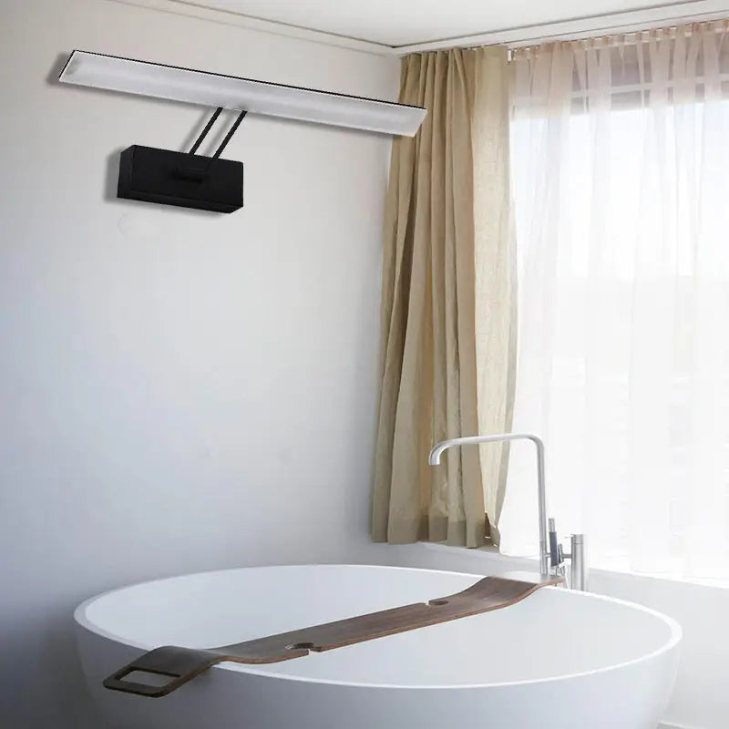 Modern white & black rectangular LED wall light in bathroom by Decorbites with warm glow on Tampa Home & Garden Store