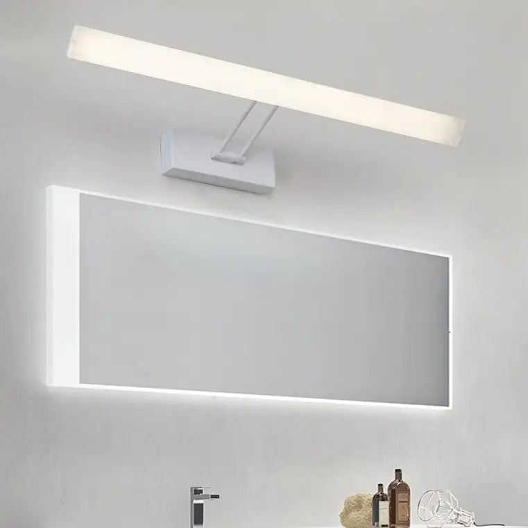 Decorbites white rectangular LED bathroom wall light above a backlit mirror on Tampa Home & Garden Store