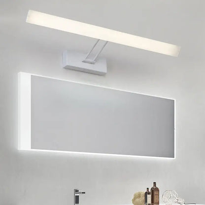 Decorbites white rectangular LED bathroom wall light above a backlit mirror on Tampa Home & Garden Store