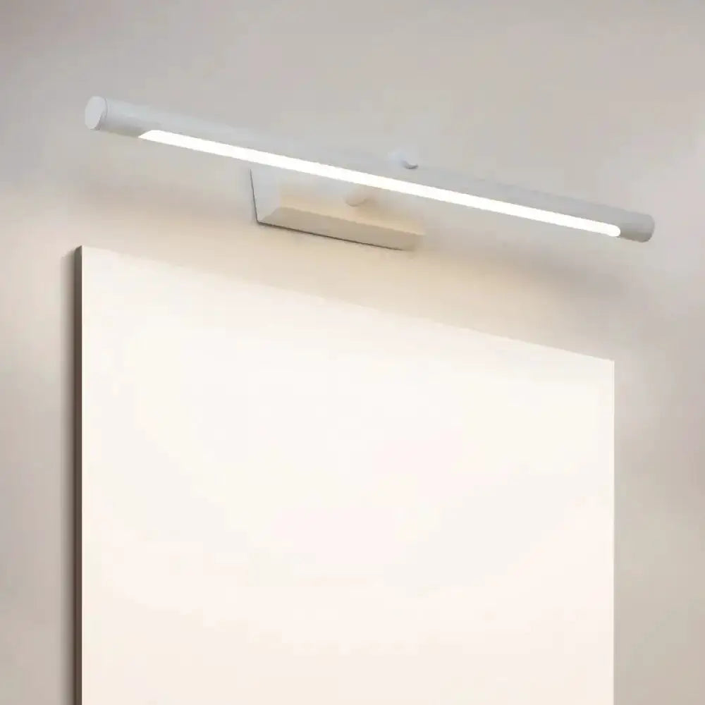 White cylindrical tube vanity light wall sconce by Decorbites for bathroom above mirror on Tampa Home & Garden Store