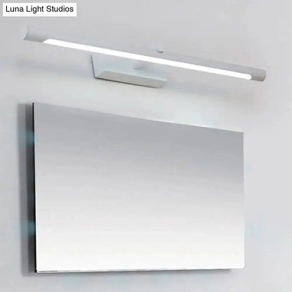 Modern white and black tube vanity light wall sconce by Decorbites over a bathroom mirror on Tampa Home & Garden Store
