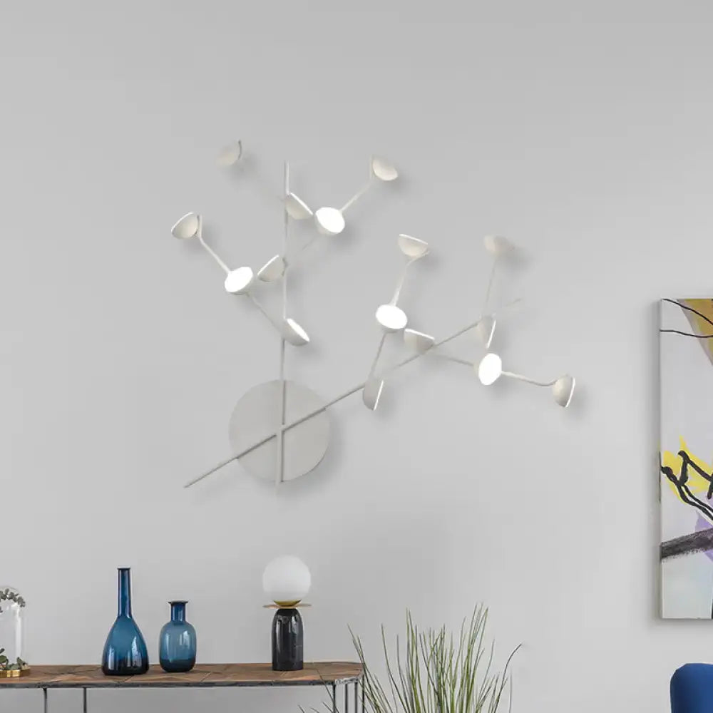 White branch metal wall sconce by Decorbites with circular white disks along branches on Tampa Home & Garden Store