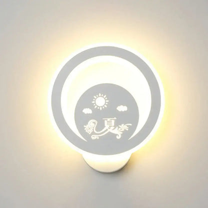 Round white LED wall light fixture featuring inner sun and clouds with floral motif on Tampa Home & Garden Store