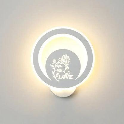 Modern white circular LED wall light with rose graphic and LOVE text, Decorbites bedroom decor on Tampa Home & Garden Store