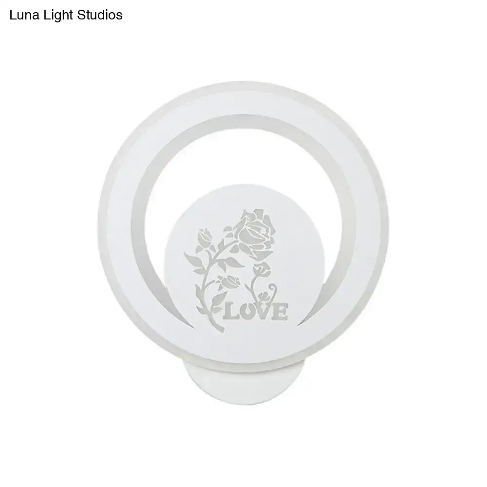 White circular LED wall light with floral rose motif and LOVE text on Tampa Home & Garden Store