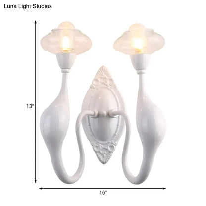 White ceramic double wall sconce with ornate backplate and candle bulbs, Decorbites on Tampa Home & Garden Store