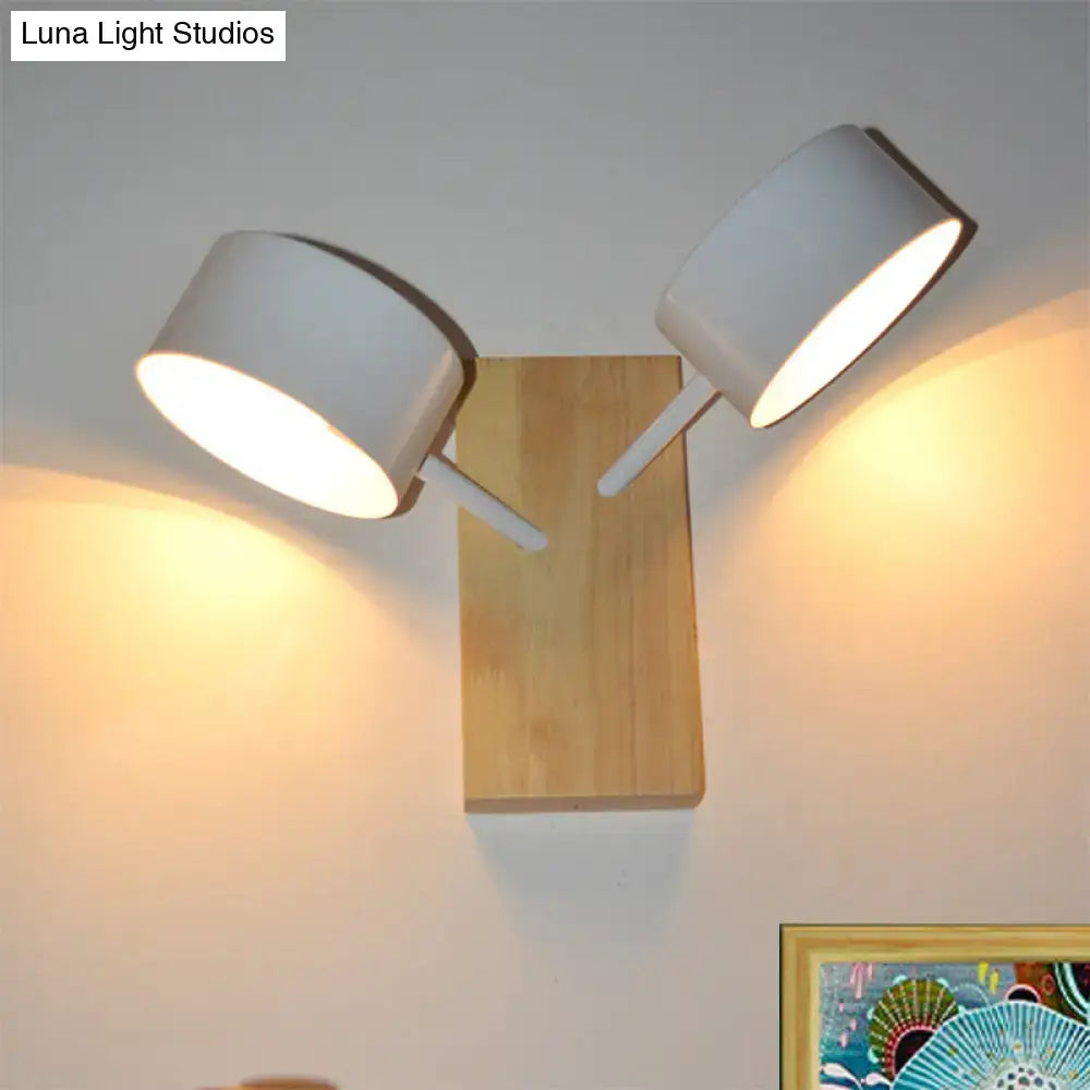 White ceramic drum sconce with wood backplate and dual white arms, Decorbites wall light on Tampa Home & Garden Store