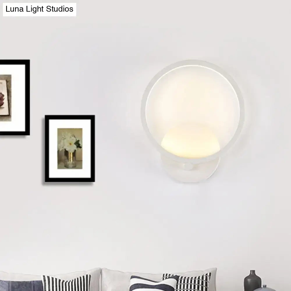 White Circle LED Sconce, white round wall light by Decorbites, warm glow on Tampa Home & Garden Store