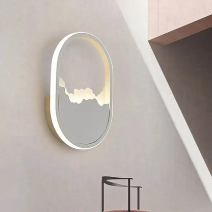Oval white cracked-design wall sconce lamp with backlit edge for stairway lighting Decorbites on Tampa Home & Garden Store