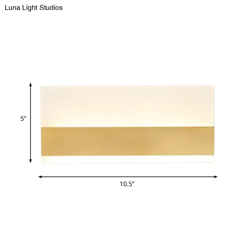 Decorbites white cuboid acrylic wall sconce with warm LED & gold band accent, 10.5 in wide on Tampa Home & Garden Store