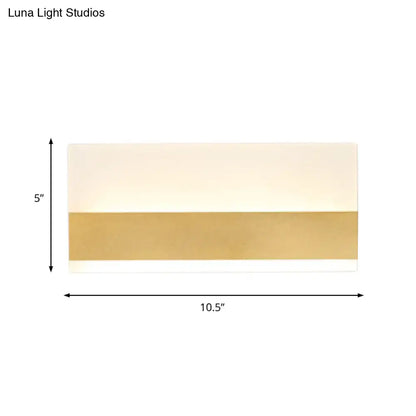 Decorbites white cuboid acrylic wall sconce with warm LED & gold band accent, 10.5 in wide on Tampa Home & Garden Store