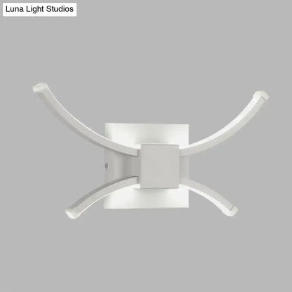 Decorbites white metal LED sconce with curved arms wall-mount fixture on Tampa Home & Garden Store