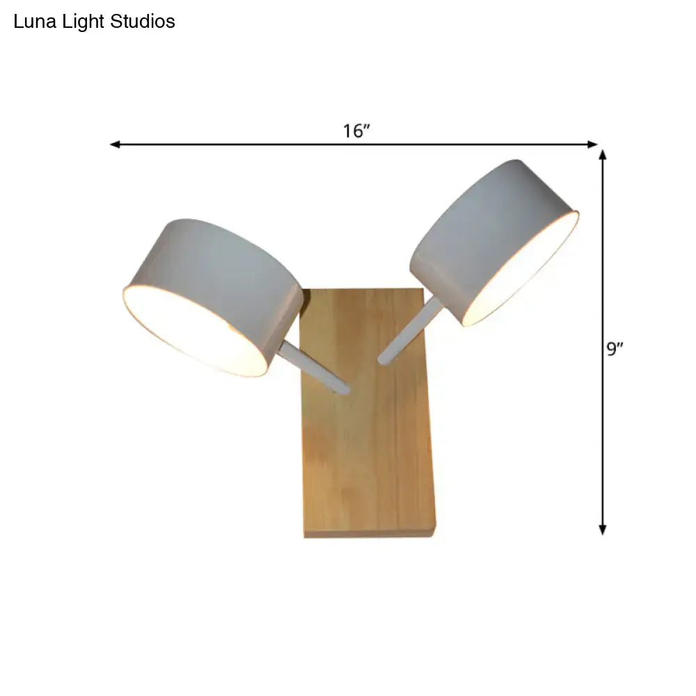 White dual-drum wood wall sconce with two white drum shades and natural wood backplate Decorbites on Tampa Home & Garden Store