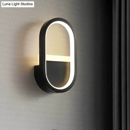 White Elliptical LED Wall Sconce with black frame by Decorbites on Tampa Home & Garden Store