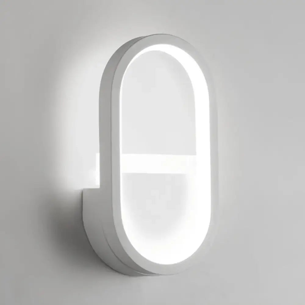 White elliptical LED wall sconce by Decorbites, halo-style backlit arc on Tampa Home & Garden Store